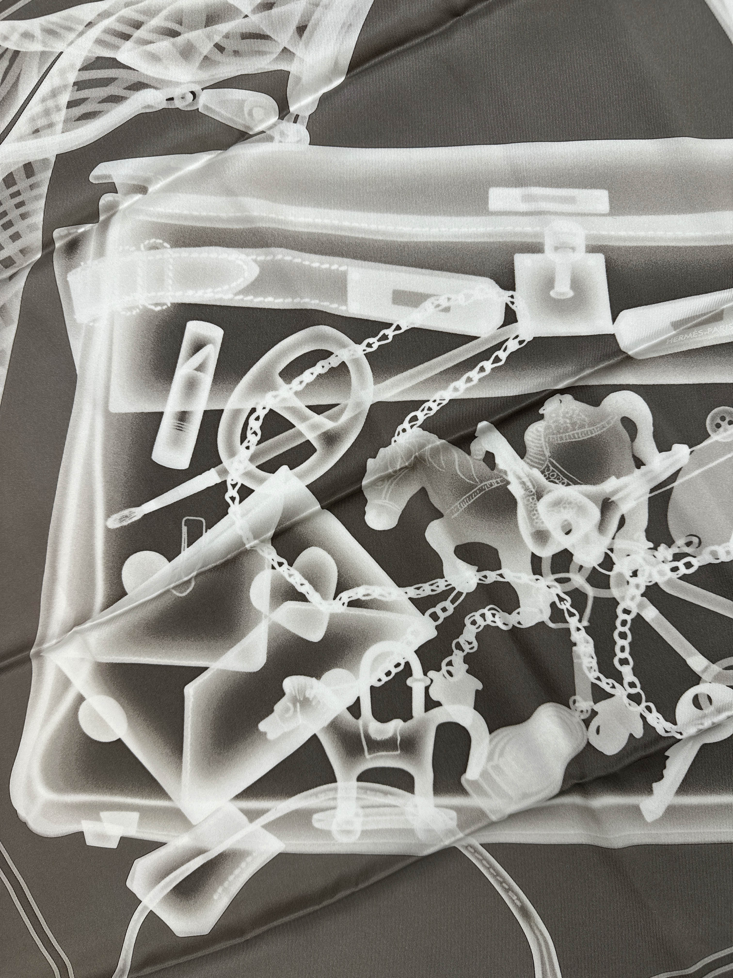 Hermès Please, Check in 70