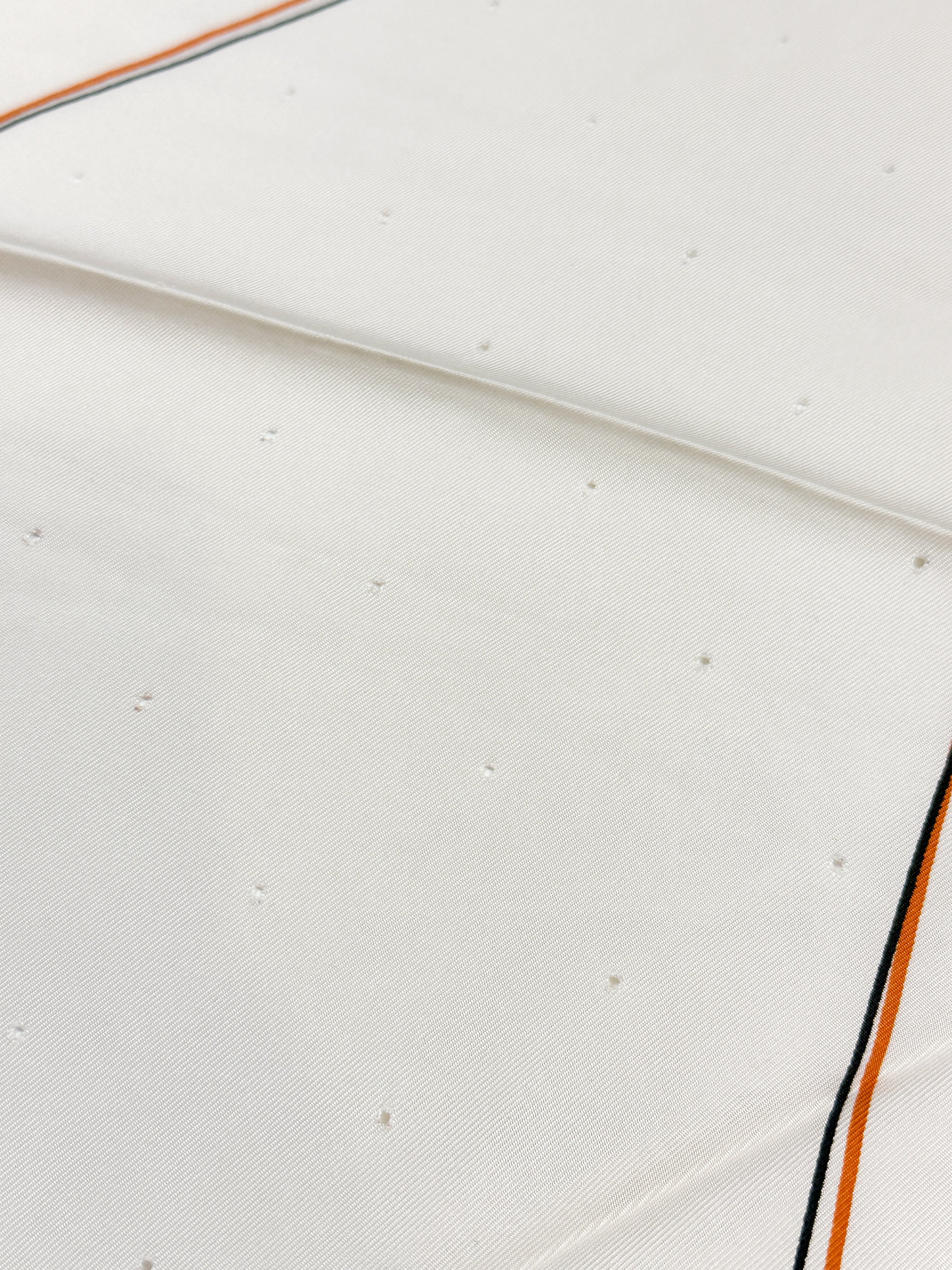 Hermès Pointu Trou de Mémoire  Perforated Triangle